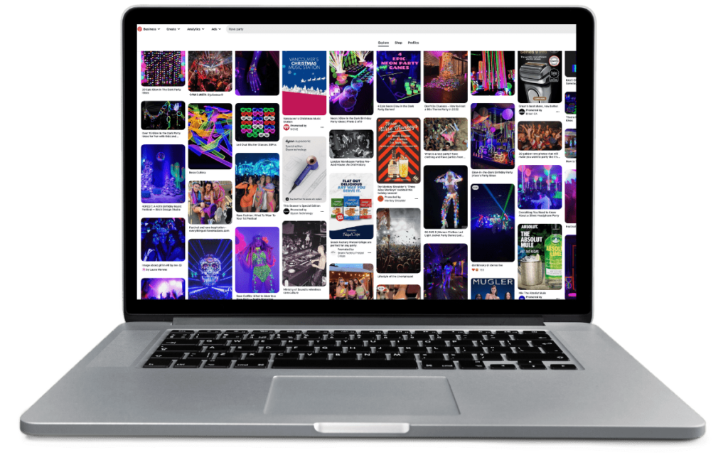 Laptop with neon party photos
